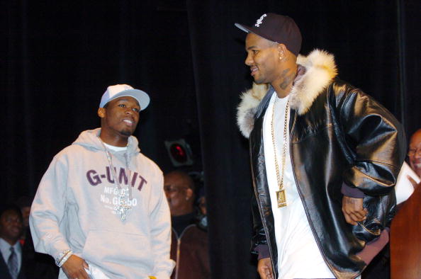 Rappers 50 Cent (left) and The Game share the stage during a