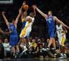 Los Angeles' Lakers guard Kobe Bryant (C