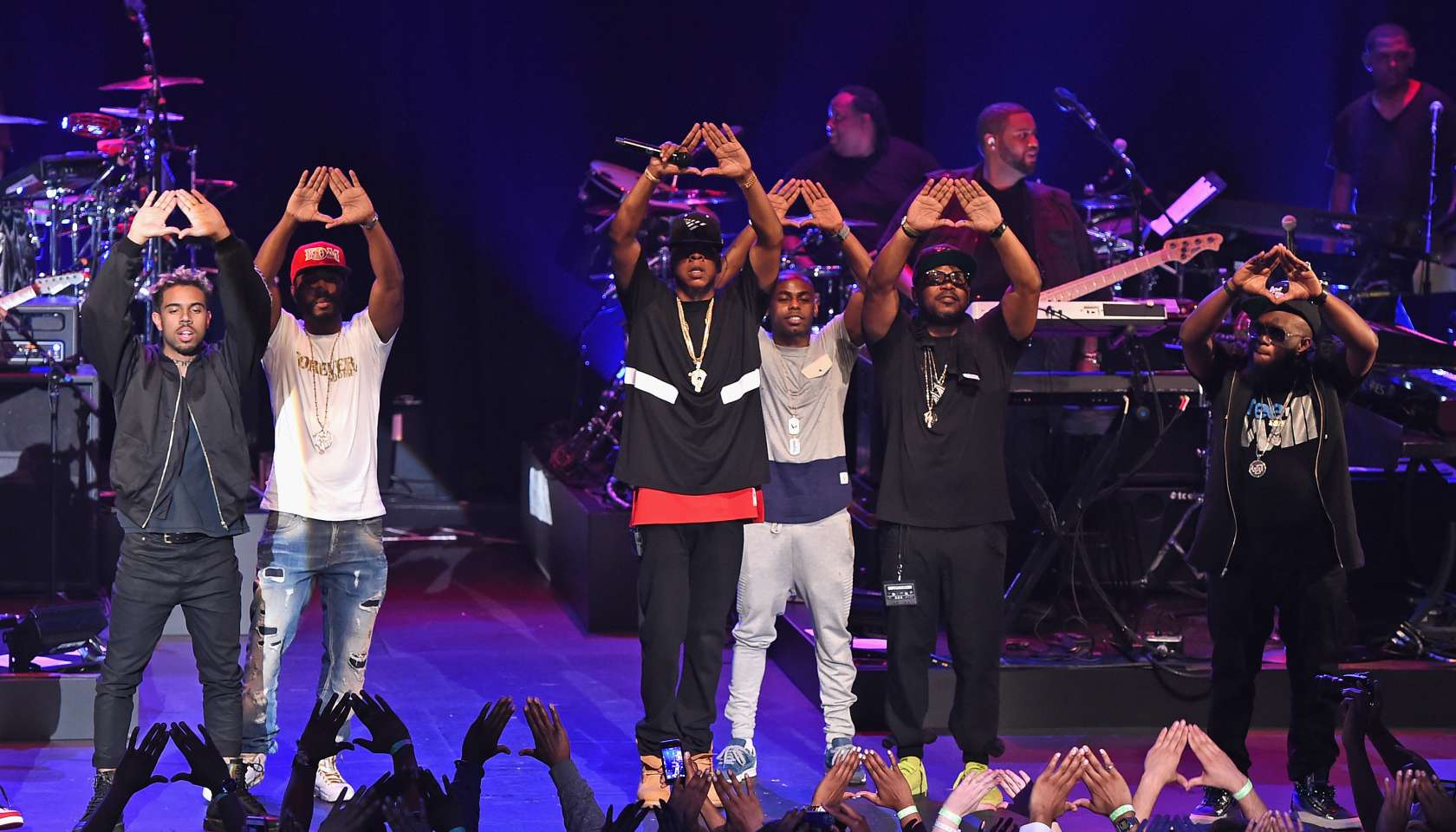 Neef Buck, Jay-Z, and Freeway appear onstage during TIDAL X: Jay-Z B-sides in NYC on May 16, 2015 in New York City
