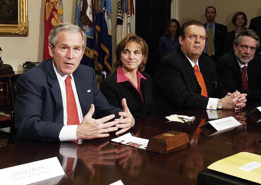US President George W. Bush (2nd L) spea
