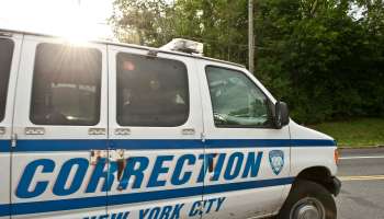 A New York City Corrections van carrying