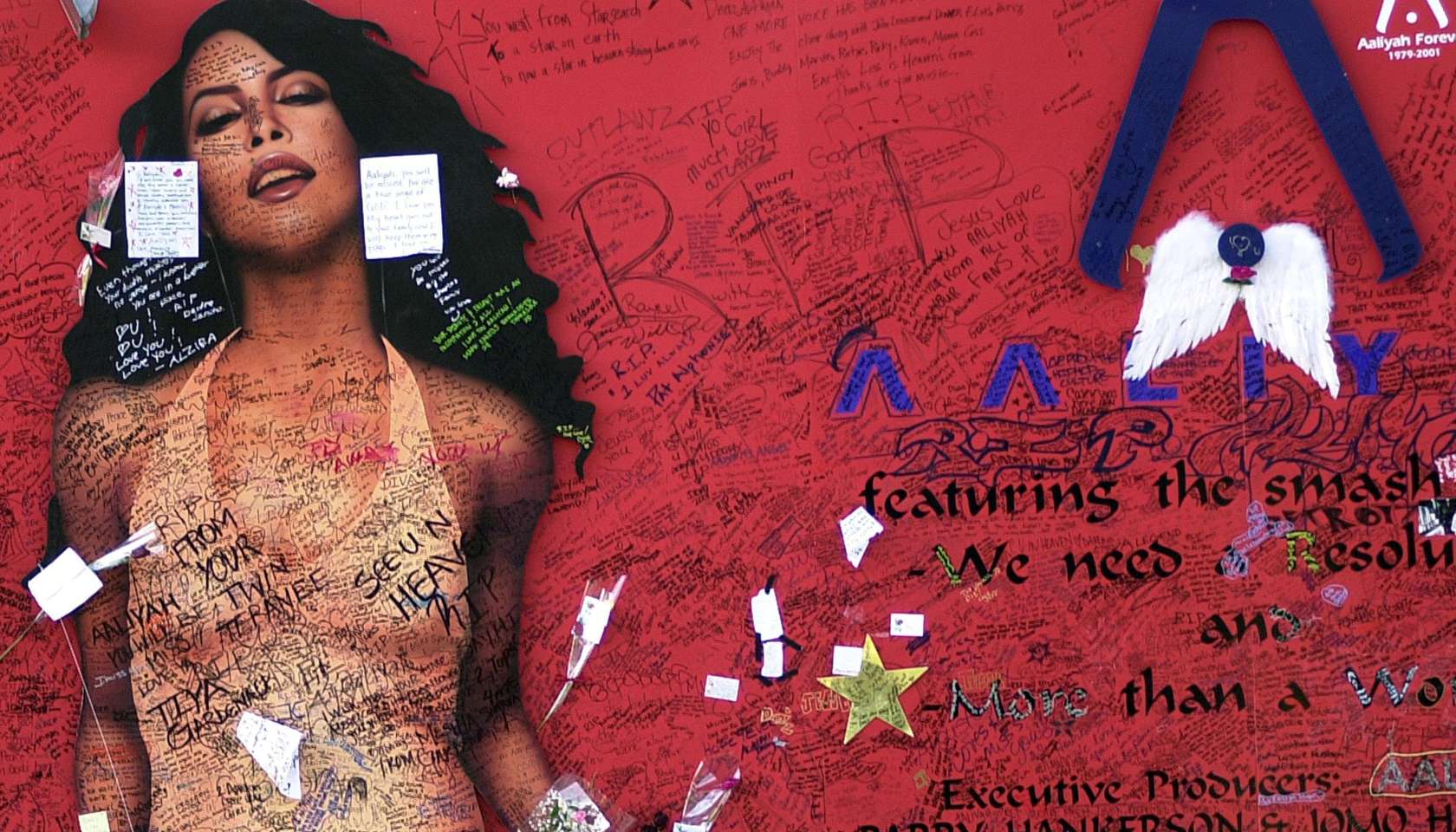 Aaliyah Fans Sign Mural In Tribute