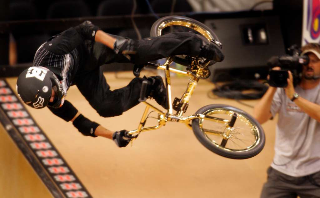 Dave Mirra performs a move during the first round of the BMX Freestyle Vert Finals at Staples Cente