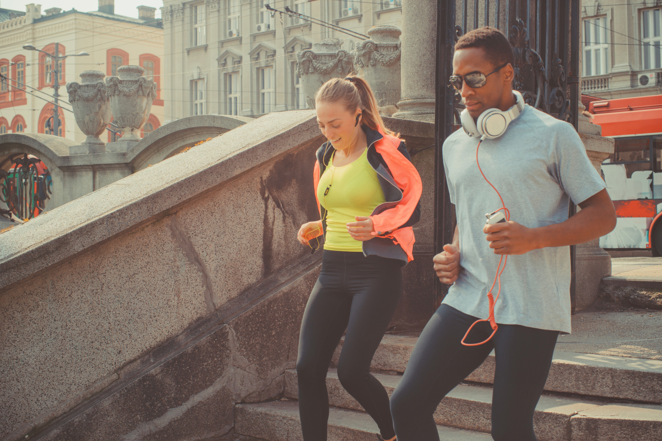 couple jogging on street