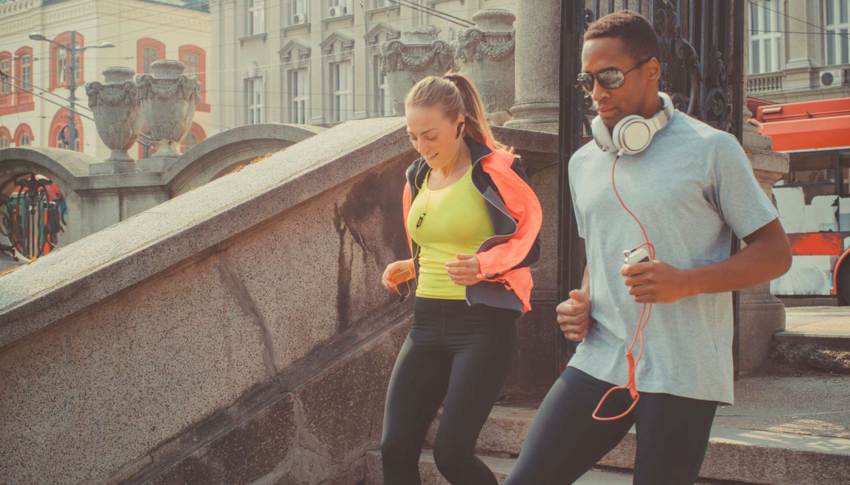 couple jogging on street