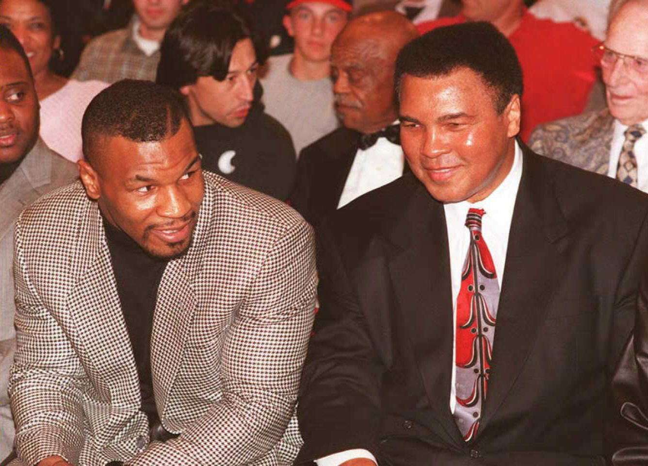 Former heavyweight boxing champion Mike Tyson (L)