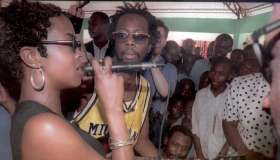 Lauryn Hill (L) and Wyclef Jean of the Haitian-Ame