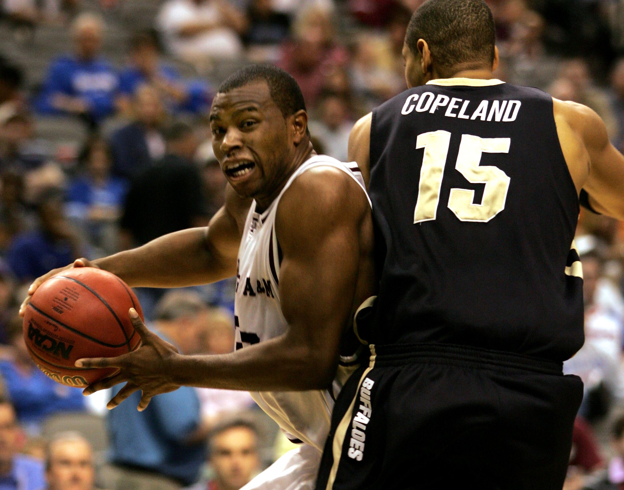 Texas A&M's Joseph Jones, left, drives around Colorado's Chr